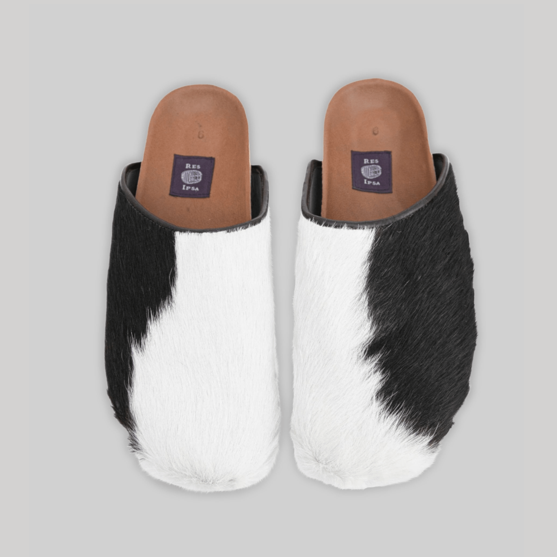 Cowhide clogs on sale